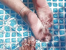 Cleaning The Pool While Barefoot