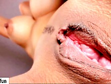 A Pretty View From Beneath Into The Open Pussy,  The Uterus Is Visible.