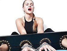 Torturing her sexy feet locked in stocks