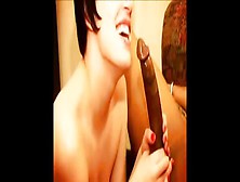 Short Haired Brunette Enjoying A Long Black Penis