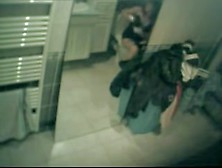 Wife stripping and staying nude before mirror in bathroom