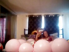 Horny pretty long hair milf popping balloons with cigarettes