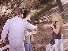 Two Insatiable Men Grabbed A Salacious Sweetie To Pound Her Outdoors