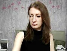 Brunette amateur with naked shoulders on webcam