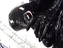 2 Lesbian Mastubed In Latex Catsuit With Stapo