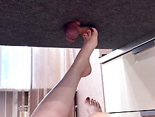 Guy Pushes Cock Through Hole On Massage Table To Get A Footjob