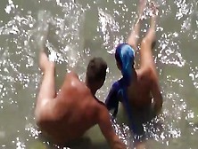 Girl Sucks Dick Her Boyfriend In The Surf At A Public Beach