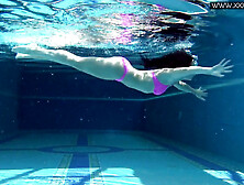 Jessica Lincoln swims sexy naked in the pool