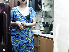 Indian stepmom watches and enters her stepson's Kitchen to fuck him.