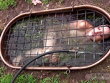 Scaring the curvaceous babes with fire in the outdoors BDSM session