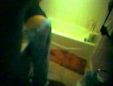 Old Bathroom vid--gal in a black thong