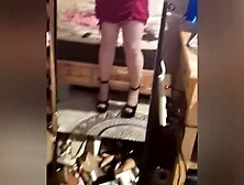 Chap wearing hawt red dreas hose and heels