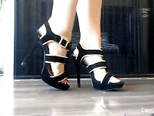 Lovely Feet With Red Toenails Trying On Some Hot Shoes In Front Of The Fireplace.