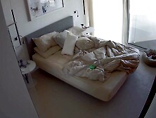 White bedroom: G-string getting dressed