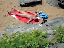 Nude Girl On Beach Sunning.