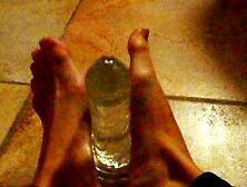 Ariel Ortiz gives a good footjob to her largest transparent dildo