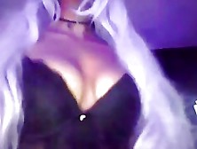 Girl With Purple Hair Plays On Webcam