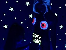 Big-Tit Babe Is Showing Her Big Tits In The Glowing Paints