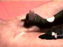 Sensual leather gloves handjob