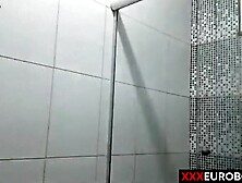 Twink David Scott jams his cock in the bathroom while watching porn