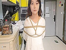 Chinese Girl In Long Dress In Bondage