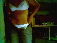 Tanned gal in white thong