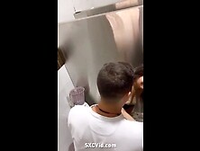 Couple Up To No Good In Public Toilet