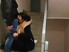 Chubby Brunette Does Blowjob In The Entrance