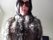 Playgirl with sunglasses handling a wang