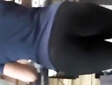 Tattooed woman running in treadmill