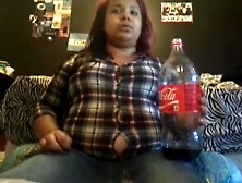 bloat, bursting out of button up shirt