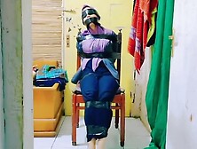 Hijab Indo Taped To A Chair