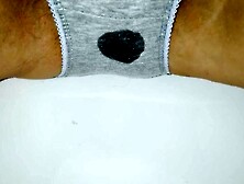 wetting: voided urine in gray pants