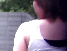 Her golden stream leaks through her panties in public corner