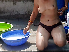 Stepsister desi in beautiful red tights is bathing completely naked in the open bathroom in the stepsister red tights