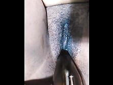 Masturbating with a beer bottle