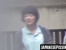 Naughty schoolgirls are peeing outside after school let out