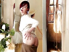 This Rich Mature Redhead By The Couch Gets Hot And Plays Herself.