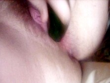 French girl bates with cucumber