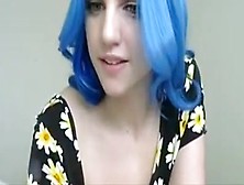 Blue Haired Girl In Flowers Plays With Tits