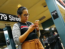 Cute Chubby Filipina Girl With Glasses Waiting For Train