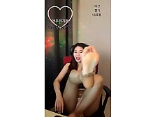 Lingerie-clad Korean babe exposing her hot Asian feet with yellow toe nails