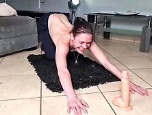 petite bitch doing pushups while gagging on a dildo topless