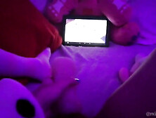 Wild Asian fuckslut dims the light and plays with her cunny while witnessing anime porn on her smartphone