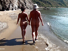 Wicked Nude Chicks In Sunglasses Tanning Themselves At The Beach.