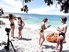 Two hot lesbians Rebeka Ruby and Miss Pussycat are having fun on the beach.