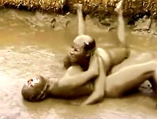 Naked mud wrestling