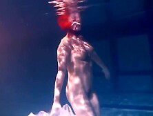 Bulava Lozhkova With A Red Tie And Skirt Underwater