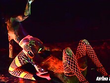 Two Lesbians In Glowing Lingerie Are Having Hot Sex