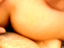 Slender dark haired with little perky melons grinds her twat on his cock